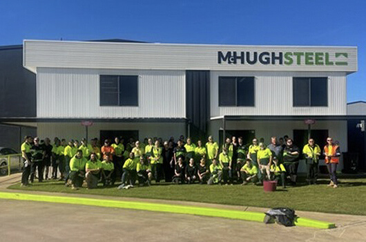 Large team photo of all McHugh Steel employees
