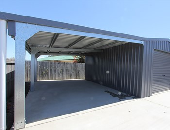 Double bay carport attached to a single bay garage