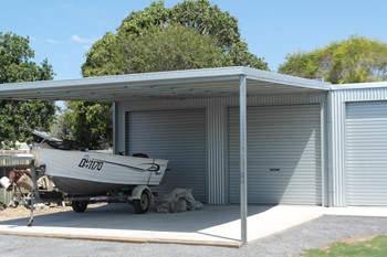 Need a carport to fit the boat and car?  We can help!